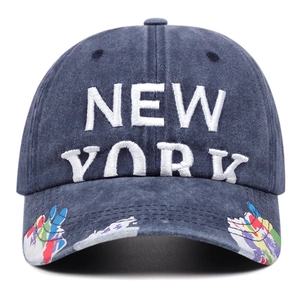 Navy blue wash denim baseball cap with New York embroidery and graffiti print on the brim