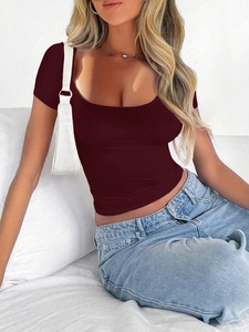 Close-up of wine red U-neck slim fit cropped T-shirt in soft cotton blend fabric