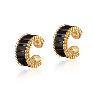 Close-up of 18K gold-plated C-shaped ear cuffs with black baguette-cut zircon inlay