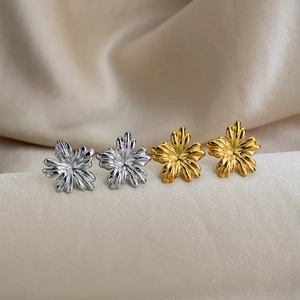 3D trumpet flower stud earrings in 18K gold and silver plating on silk fabric