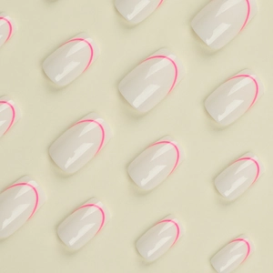 Minimalist square oval false nails with creamy white base and pink arc line patterns