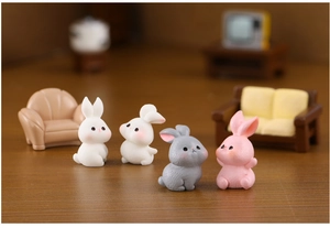 Miniature resin rabbit figurines in white and pink for micro-landscape decor