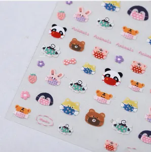 Detail of TK-030F nail art stickers featuring cute animals wearing masks and strawberries
