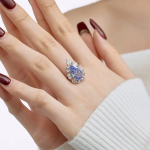 Luxury S925 silver pear cut blue zircon ring with sparkling white diamond halo