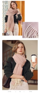 Detail of pink scarf with herringbone weave pattern and soft beige fringe tassels