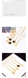 Detail of vintage 18K gold-plated titanium steel necklace and earrings set with shell inlay