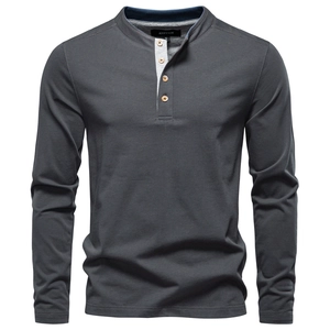 Close-up of three-button placket and textured dark grey knit on a men's Henley shirt