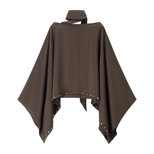 Dark brown bohemian poncho top with halter neck and silver rivet details on white background