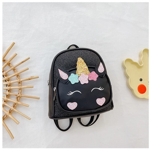 Close-up of a sparkling unicorn toddler backpack with sequins and pink PU leather details