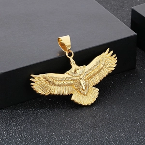 Hiphop gold flying eagle pendant in stainless steel displayed on a black premium gift box