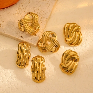 Elegant 18k gold plated stainless steel heart and woven earrings on a stone base