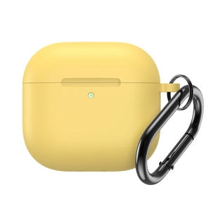 Detail of yellow silicone AirPods 4 case with black metal carabiner and indicator hole