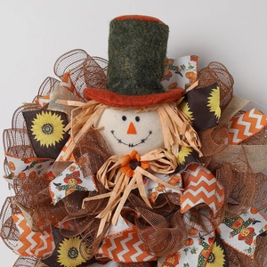 Autumn scarecrow wreath with sunflower ribbons and burlap for Thanksgiving wall decoration