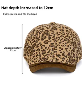 Detail view of leopard print flat cap showing 12cm depth and dark brown suede brim