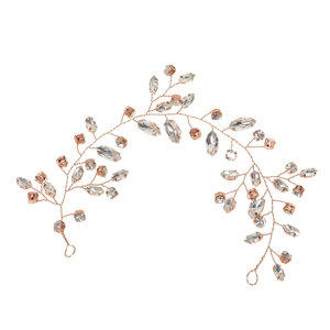 Detail of rose gold bridal hair vine with crystal rhinestones for wedding hairstyles