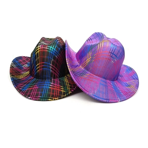 Detail of black and purple western cowboy hats with vibrant rainbow plaid metallic patterns