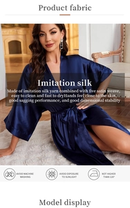 Detail of navy blue imitation silk robe featuring smooth satin texture and skin-friendly fabric