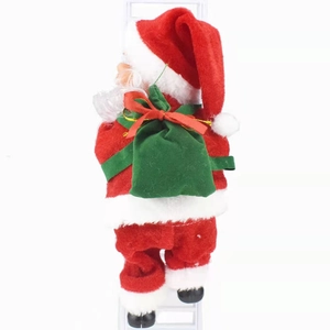 Electric musical Santa Claus climbing a white ladder with green gift bag decoration