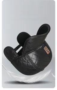 Close-up of quilted windproof fabric and leather SPORT badge on thermal winter cap