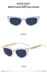 Detail of white cat eye sunglasses with gold metal hollow chain arms and gray lenses
