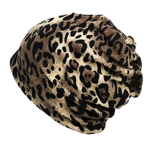 Detailed view of the leopard print pattern and knitted texture on a warm winter snood