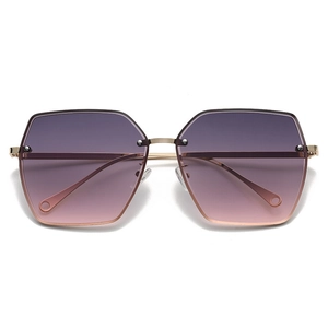 Modern oversized rimless sunglasses with purple to pink gradient lenses and gold metal temples