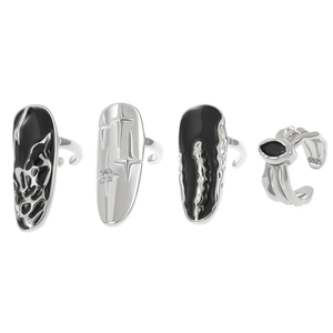 Detail of S925 silver nail ring featuring black enamel and zircon star engraving