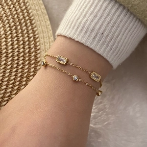 Bracelet élégant à double chaîne dorée avec cristaux de zircon géométriques pour femme
