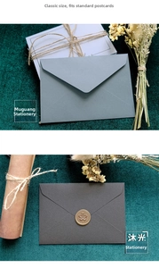 Close-up of vintage 120g art paper envelopes in grey-blue and charcoal with wax seal