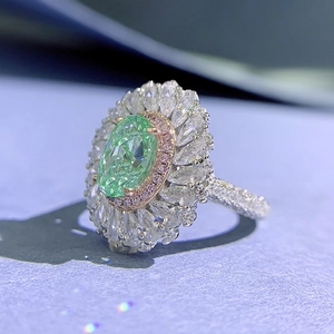 Exquisite 925 silver ring with large oval green gemstone and floral halo setting