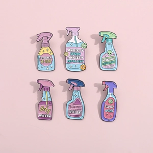 Creative enamel pin set featuring colorful spray bottles with funny anxiety text labels