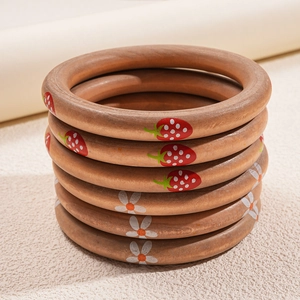 Three-piece stackable wooden bangles with strawberry and floral prints for women