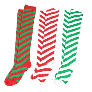 Detailed flat lay of three pairs of striped over-the-knee socks in festive colors