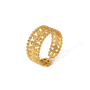 Detailed close-up of 18k gold plated stainless steel ring with hollow leaf pattern