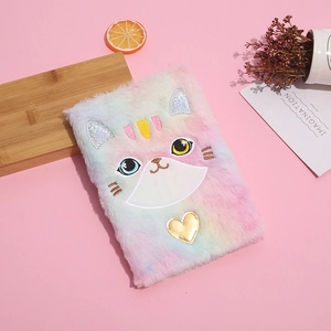Cute rainbow plush cat diary with colorful embroidery and golden heart on pink background