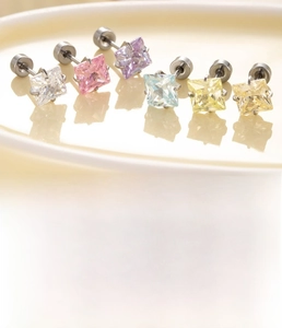 Detailed view of square zircon stud earrings in various candy colors and titanium steel