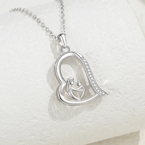S925 sterling silver heart necklace featuring mother holding child with zircon stones