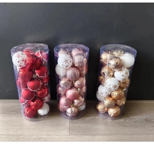 Detailed view of Christmas balls in three buckets with glitter, matte and snowflake patterns