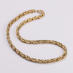 Detail of 6mm golden stainless steel Byzantine chain necklace with intricate link craft