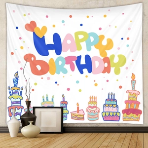 Detail of bohemian birthday wall tapestry featuring hand-drawn cake and happy birthday text