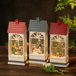 Set of three Christmas wind lantern music boxes with snow scenes and warm lighting