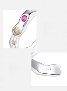 Macro detail of S925 sterling silver ring with colorful zircons and metal hallmark