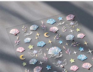 Detail of 3D shell nail stickers with iridescent finish and soft shadow lighting