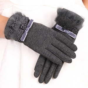 Elegant grey winter thermal gloves for women with faux fur trim and velvet bow detail