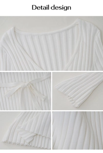 Détails de la robe blanche en maille avec col en V, texture côtelée et volants aux manches
