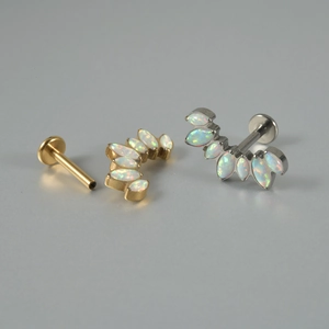 G23 titanium labret studs with gold and silver leaf designs and white opal inlay