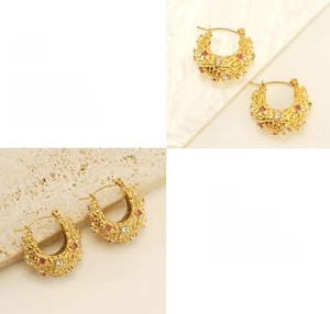 Detailed view of 18K gold plated earrings with pink zircons and textured finish