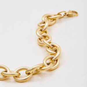 Close-up of vintage 18K gold plated stainless steel chunky twisted chain bracelet