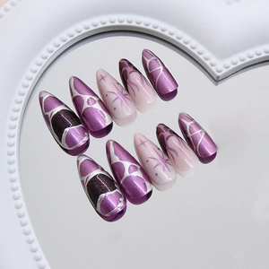 Purple cat-eye press on nails with silver stars and celestial 3D metallic accents
