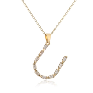 Detail of 18K gold-plated U-shaped pendant set with rectangular cubic zirconia stones